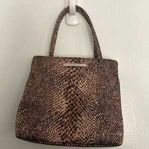 Mini Nine West snake print wrist purse